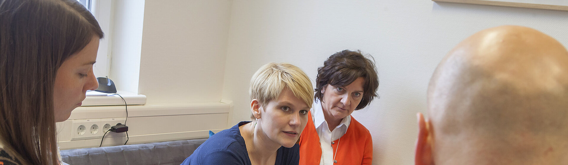 Das Sozialpädiatrische Team in einer Besprechungssituation. Das Sozialpädiatrische Team in einer Besprechungssituation.